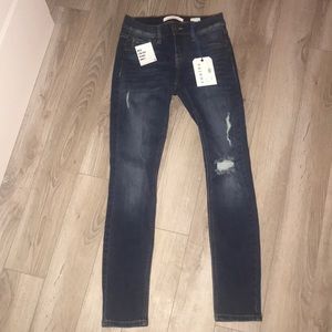 lightly ripped jeans